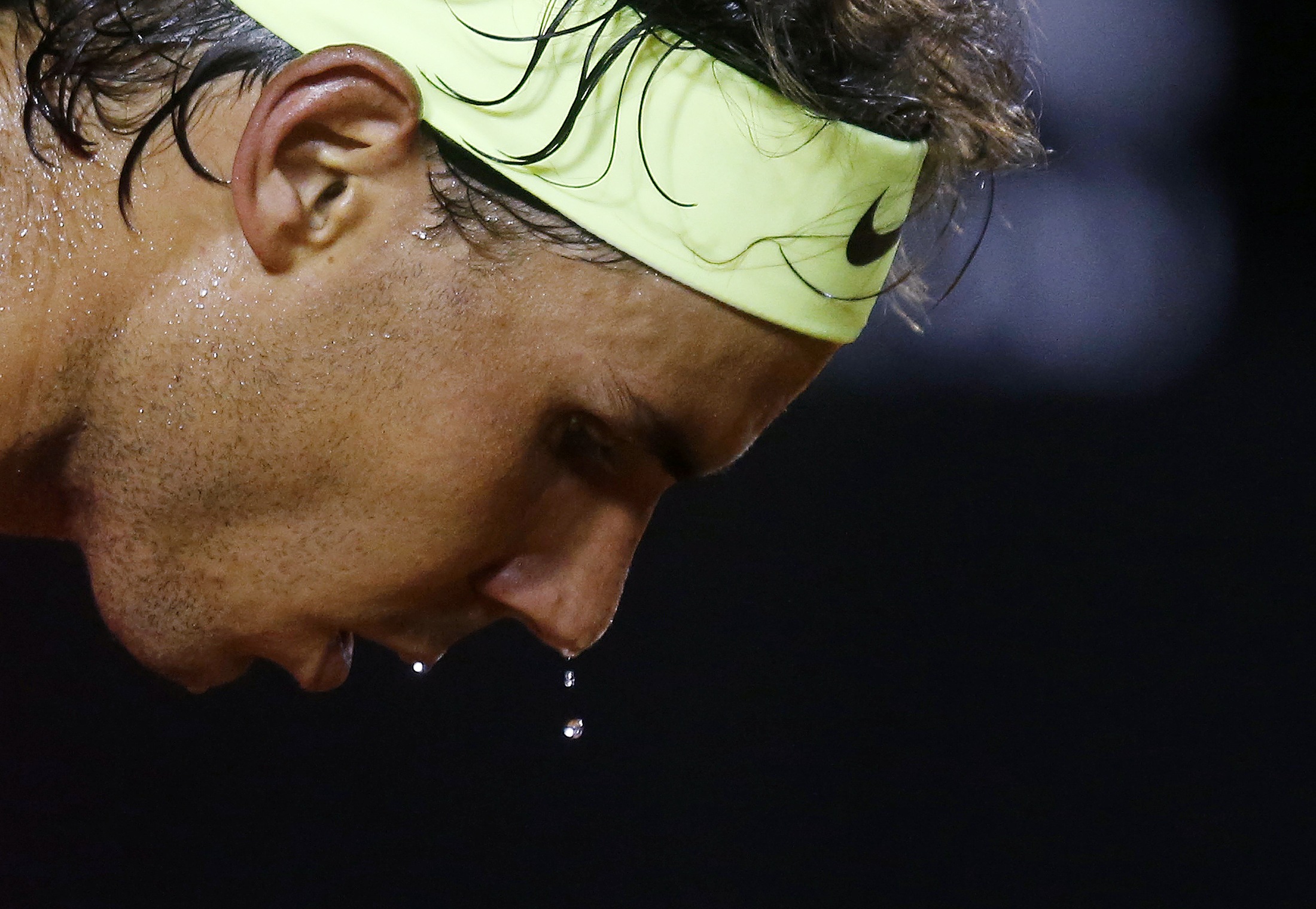 Sweat drips from the face of Spain’s Nadal, as he prepares to serve to compatriot ...2200 x 1520