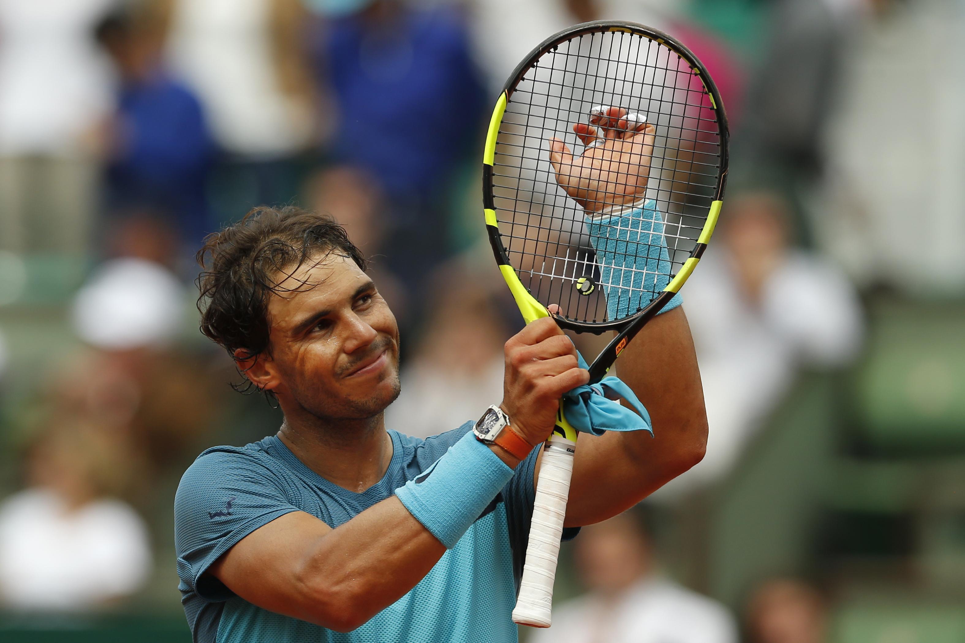 PHOTOS: Rafael Nadal reaches 200 Grand Slam victories with straight sets win over ...