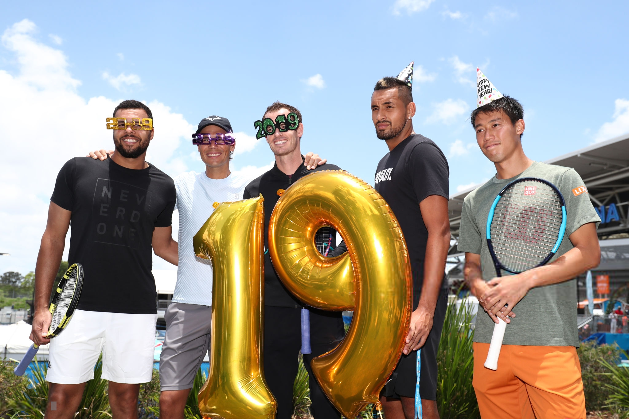 Jo-Wilfried-Tsonga-Rafael-Nadal-Andy-Murray-Nick-Kyrgios-and-Kei-Nishikori-pose-for-a-New-Years-themed-photo-outside-Pat-Rafter-Arena-for-Brisbane-International-2019-7.png